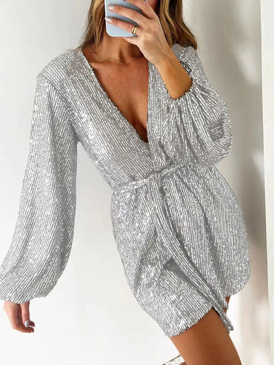 Full Size Sequin Surplice Tie Waist Long Sleeve Romper - Your Second Look